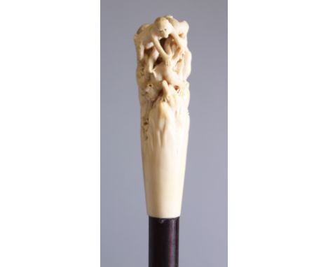 A GREAT QUALITY JAPANESE IVORY OKIMONO/WALKING STICK MONKEY GROUP, the carved handle depicting a mother saving one of her you