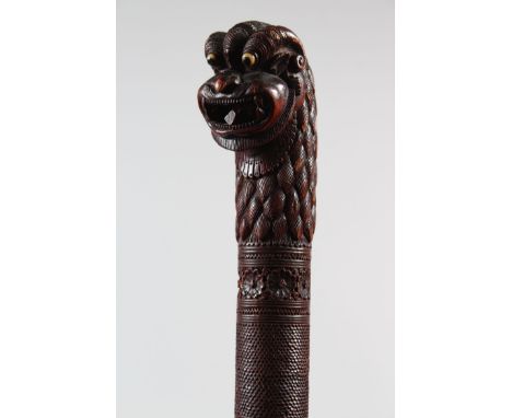 A SIMILAR WALKING STICK, 98cm long.