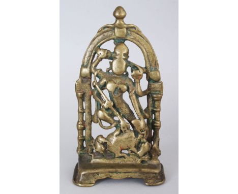 A BRASS SHRINE DEPICTING DURGA SLAYING THE BUFFALO DEMON (MAHISASURAMARDINI), WESTERN INDIA, CIRCA 15TH/16TH CENTURY, the fou