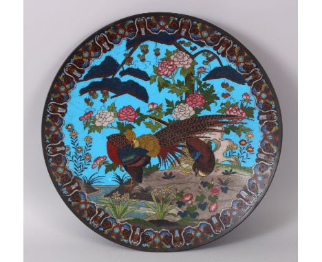 A LARGE JAPANESE  CLOISONNE ENAMEL CIRCULAR CHARGER, the front decorated with brilliant coloured birds and flowers, 48cm diam