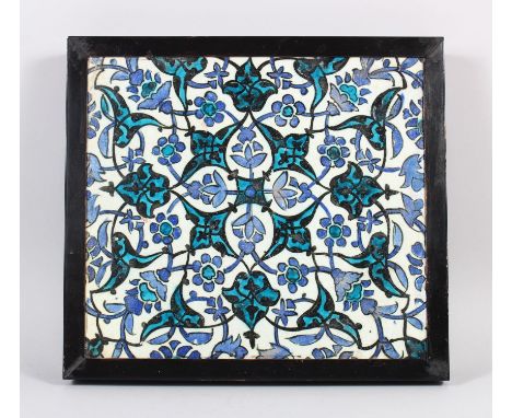 A SUPERB 16TH CENTURY DAMASCUS GLAZED POTTERY TILE, in a wooden frame, 31cm square.