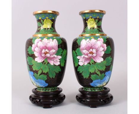 A PAIR OF JAPANESE CLOISONNE ENAMEL VASES AND STANDS, decorated with flowers and birds. 16cm high.