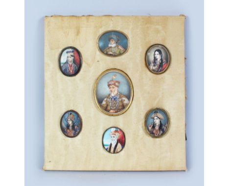 A COMPANY SCHOOL COLLECTION OF SEVEN OVAL PORTRAIT MINIATURES on a silk mount, depicting Mughal rulers and consorts.