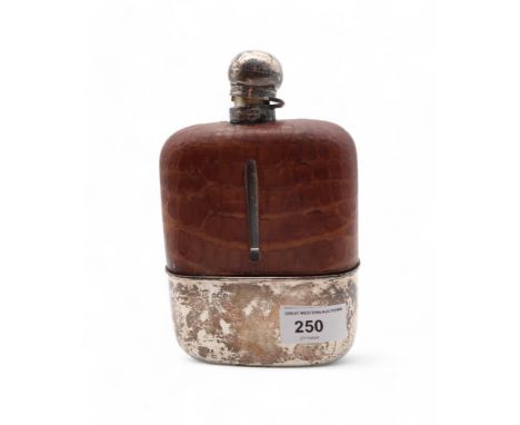 A large silver-mounted leather and glass hip flask, by&nbsp;Frederick C Asman &amp; Co, Sheffield 1921, 18cm high, 11cm wide 