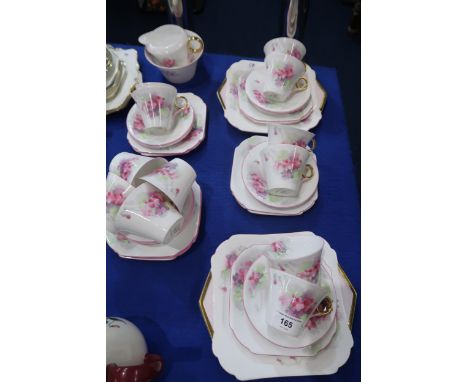 A Shelley Pink Violets pattern Regent shape fine china tea service, comprising cups, saucers, cake plates, milk jug and sugar