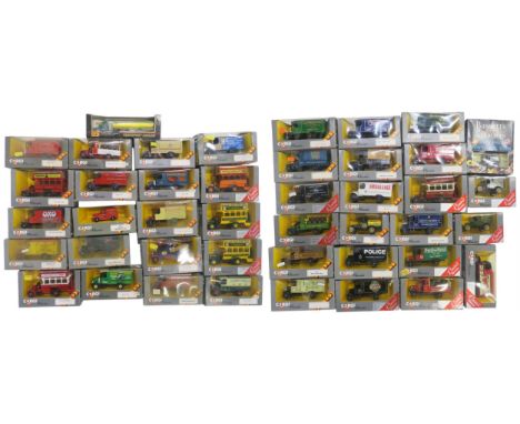 A large collection of boxed Corgi Classics 1:43-scale die-cast model vehicles, largely vintage advertising vans and buses (2 