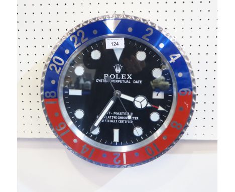 A wall clock in the form of a Rolex GMT - Master II Superlative Chronometer Condition Report:Available upon request
