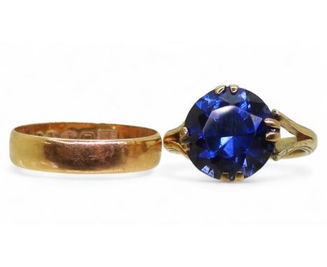 An 18ct gold Ward brothers ring set with a blue gem, size K, weight 4gms, together with an 18ct wedding ring, hallmarked Birm
