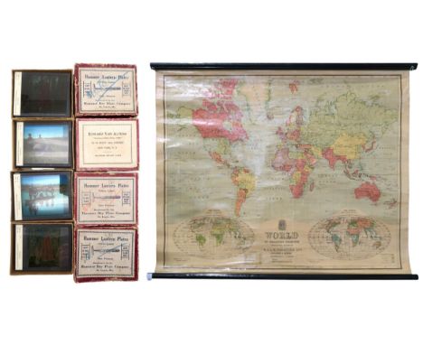 A linen-backed educational world map published by W. &amp; A.K. Johnston Ltd., measuring approx. 86cm x 68cm; together with f