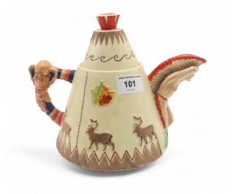 A Clarice Cliff Greetings from Canada novelty teapot, the body modelled as a teepee, with figural spout and totem handle, pri