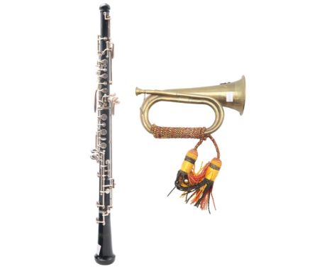 A SELMAR BUNDY Oboe, series B41097, made in U.S.A, with a fitted case. Also&nbsp;a reproduction Kumaon Regiment of the Britis