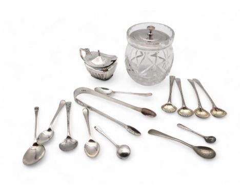 A collection of flatware including a pair of Georgian silver sugar tongs, four Old English feathered edge salt spoons, a silv