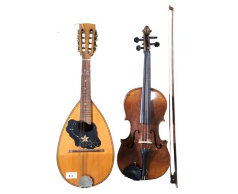 A two piece back Violin, 37cm, with bow and fitted wooden case, and a bowl back mandolin&nbsp; Condition Report:Available upo