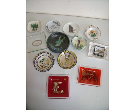 Collection of various ceramic and glass ashtrays from famous hotels of the world 
