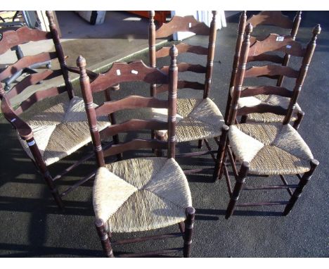 Set of five (4+1) rush seated beech ladder back chairs 