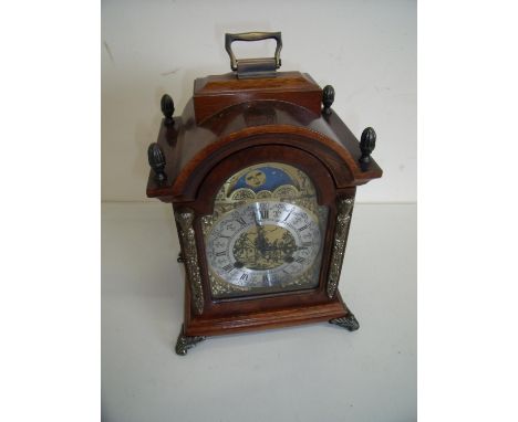 Dutch reproduction of a 19th C walnut bracket clock with striking movement (30cm high) 