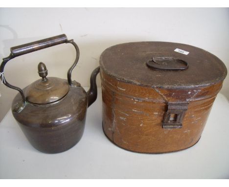 Vintage brown tin oval hat box and a Victorian copper kettle with acorn finial (2) 