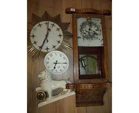 Tunbridge ware cased wall clock, circa 1970s star burst wall clock, a mantel clock in the form of a lion and a clock movement