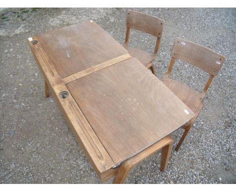 Vintage school type desk with lift up compartments and two associated chairs 