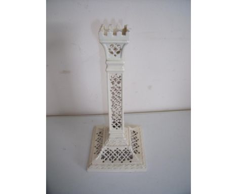 Leeds Pottery cream ware candlestick with latticework detail, square base and column, with castellated top (chips to top) (22
