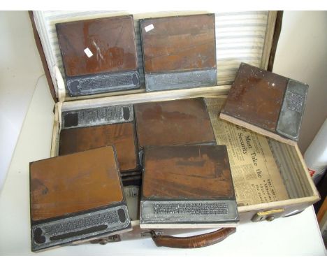 Vintage suitcase containing a selection of railway related items including various printing blocks and plates 