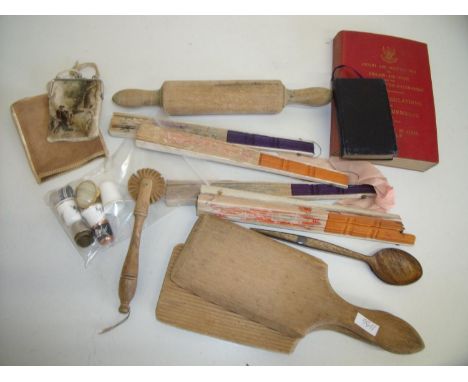 Selection of miscellaneous items including a pair of vintage wooden butter pats, roller, pastry cutter, folding fans, thimble