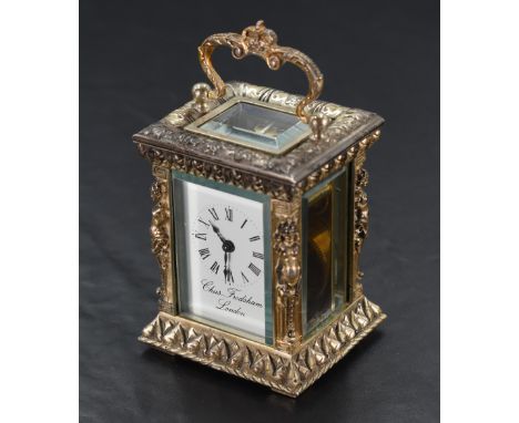 A Limited Edition miniature silver carriage clock by Charles Frodsham commemorating the Queen's silver jubilee 1977, no: 0358