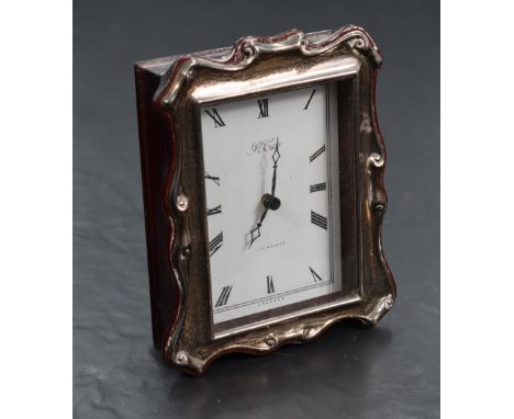 An Elizabeth II silver mounted and stained wood quartz-movement desk clock, the dial marked R.Carr, Clockmaker, England , the