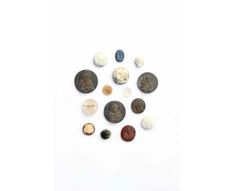 A collection of Roman and Byzantine glass and hardstone portrait cameos, to include quartz and red jasper examples, each carv