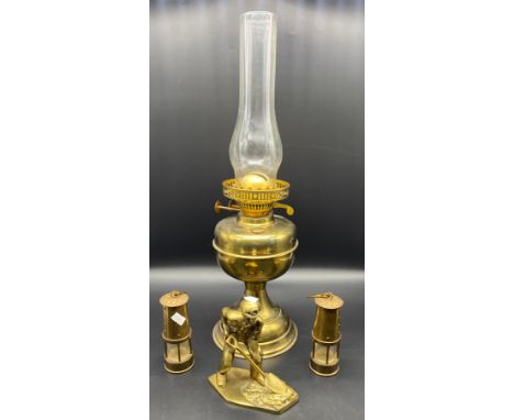 Collection of brass ware to include oil lamp and shade, two miniature oil lamps and brass mining figure 