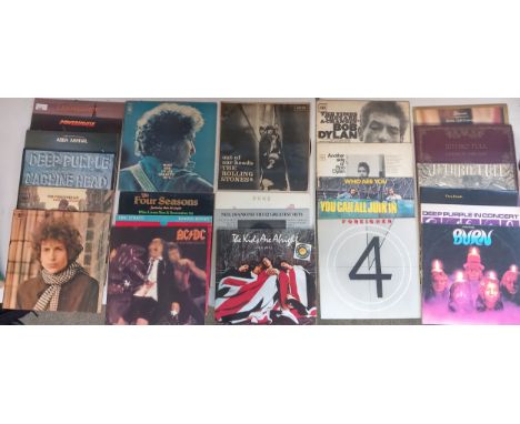 Collection of 40 LPs to include Deep Purple, Bob Dylan, Rolling Stones, ACDC and others, also to include some 45 singles. 