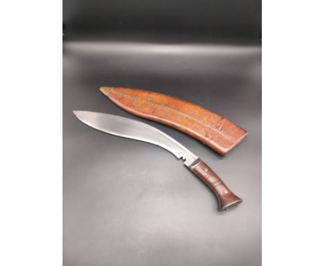 A MKII Great War pattern kukri knife with original leather sheath 