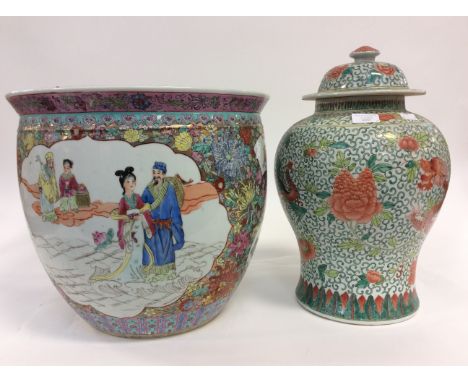 Large Chinese planter with a Famille Rose and dragon lidded vase