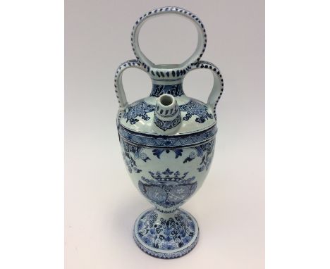 A 19th Century Dutch Delft Armorial, gin pitcher, has had handle restored