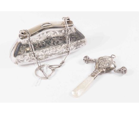 A George V silver purse with ring chain and an Art Nouveau silver babies rattle (2)