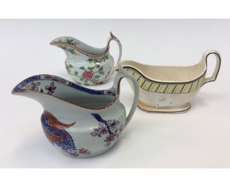 Spode Tobacco Plant pattern (Reference 2061) creamer, Spode reference 2063 creamer, and Spode rectangular based sauce boat (3