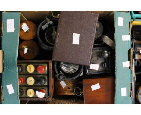 A box of seven vintage batteries including transparent battery case with cells visible and acid level indicator, several othe