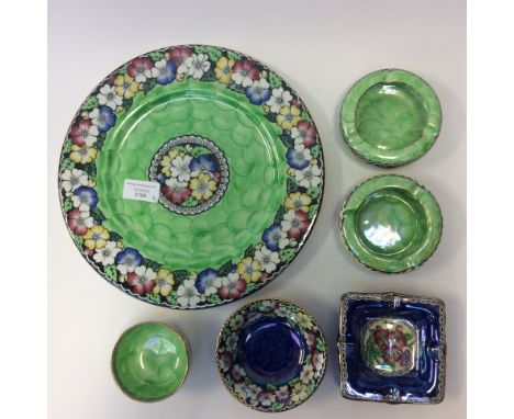 Maling ware, a large plaque, two ashtrays and a small bowl, with green lustre/floral design together with an ashtray and bowl