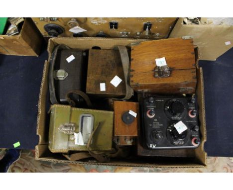 A portable olive green leather cased bakelite hand cranked mega insulation tester series 3 by Evershed and Vignoles, a record