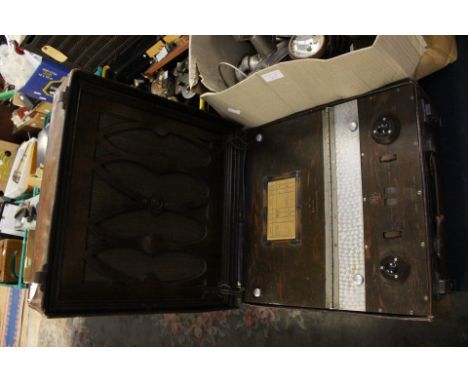 A McMichael super range power four with fretwork speaker grill within good quality leather case, numbered 19854 (1)