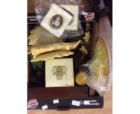 A collectors lot including various carved tourist ware; barometer; book ends etc (1 box)