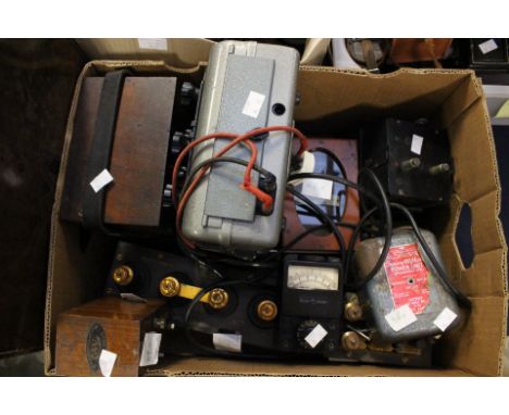 An Avo Electronic Test Meter, a Smooth Hour power unit for model trains (240 - 12V output), a Taylor Junior voltmeter, a H.W.