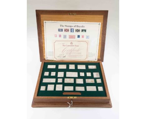 A collection of twenty five 'Stamps of Royalty' in presentation box,m solid sterling silver limited edition of 5000, each rep