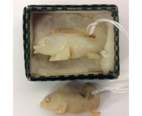 *** AUCTIONEER TO ANNOUCE CHANGED ESTIMATE £120 TO £150***A Chinese white jade carved figure of a Carp, approx 5cm x 2.5cm, t