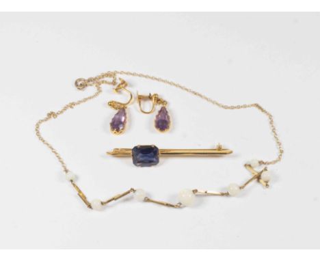 A 9ct gold brooch  set with synthetic sapphire doublet,  a pair of amethyst and 9ct drop earrings, along with an opal bead an