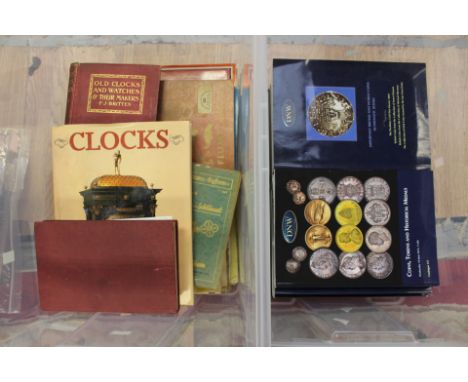 A box of clock/watch related books, two mantle clocks for restoration and a box of London coin auction catalogues