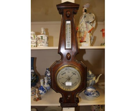 Oak barometer clock inscribed Charles Sprent of West Bromwich