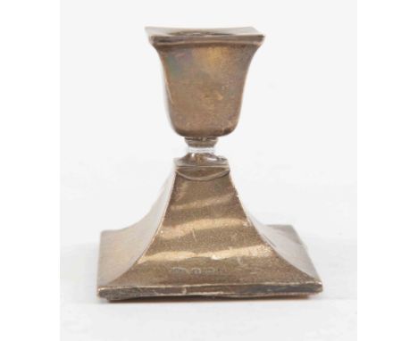 A silver-filled dwarf candlestick, Birmingham 1935, Robert Pringle