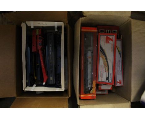 A collection of boxed Lima and Hornby carriages, with assorted carriages, with assorted buildings and accessories etc (5 boxe