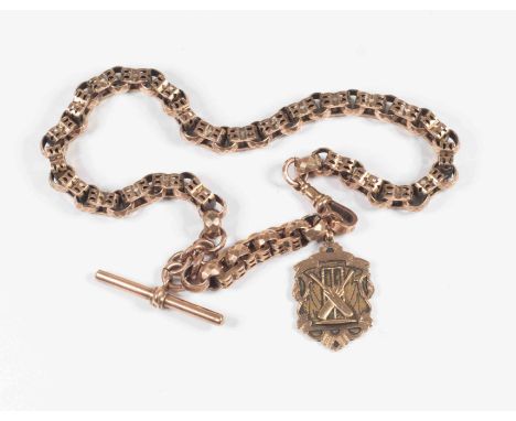 A 9ct rose gold fancy link watch chain, comprising pierced and faceted links link along with a 9ct fob cricket interest, with